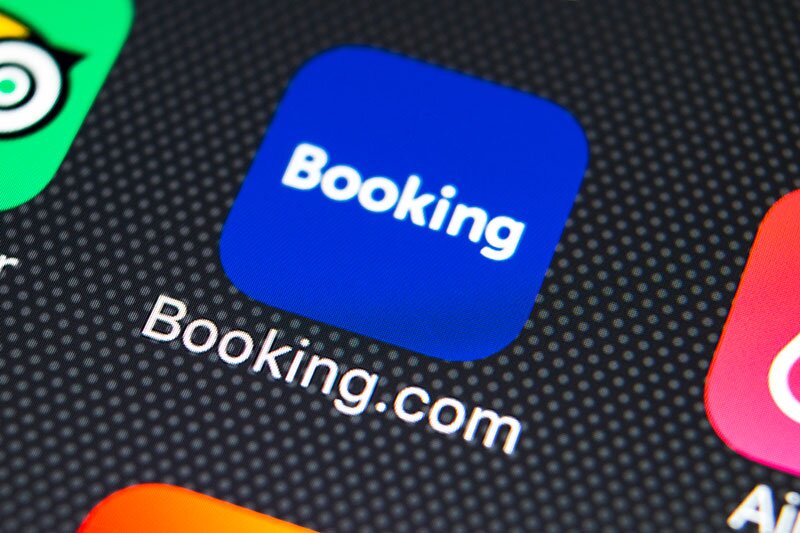 Booking Holdings reduces losses as room demand returns