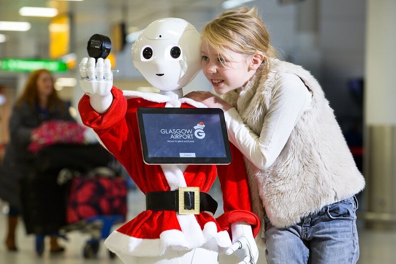 Glasgow Airport introduces robot ambassador which takes selfies